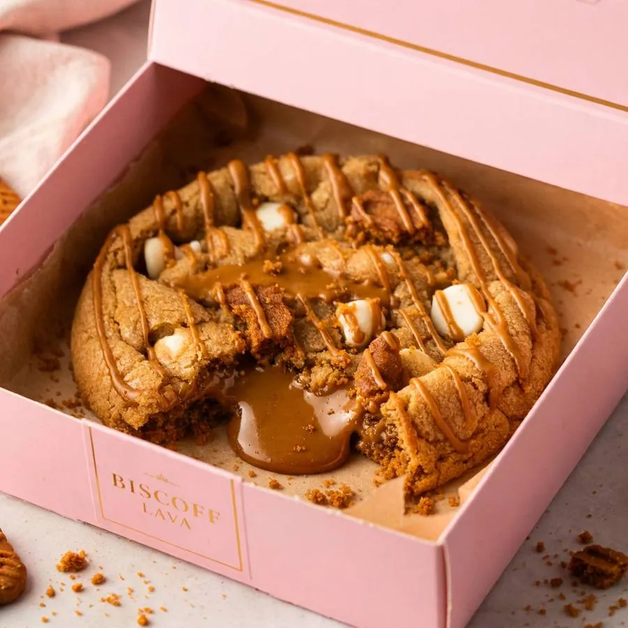 Biscoff Lava Cookie in a pink bakery box Biscoff Lava Cookie in a pink bakery box
