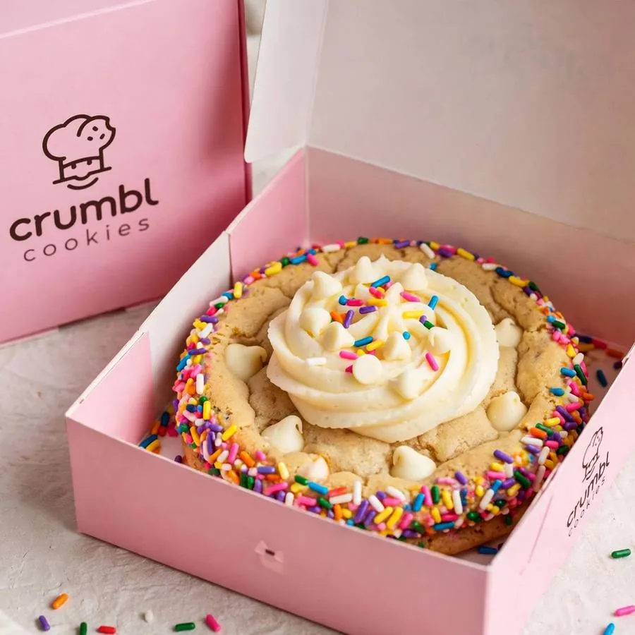 Cake Batter Blondie cookie in a pink bakery box